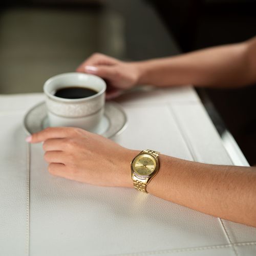 Relógio Feminino Dourado Catraca serrilhada